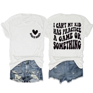 Front and back detail view of the white Sports Mama T-shirt and distressed denim shorts