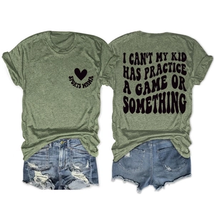 Detail of army green Sports Mama t-shirt with back slogan and distressed denim shorts