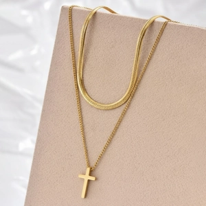 Double-layered gold stainless steel necklace with flat snake chain and cross pendant