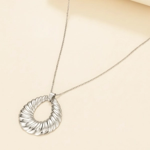 Polished silver stainless steel twisted teardrop pendant necklace on minimalist chain