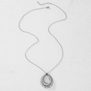 Minimalist silver stainless steel necklace featuring a teardrop spiral twist pendant