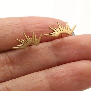 Minimalist golden sunburst stud earrings with matte brushed metal finish for women