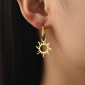Elegant gold hollow sun pendant hoop earrings made of premium stainless steel for women