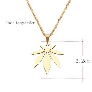 Detailed view of 45cm gold chain with 2.2cm maple leaf pendant dimensions and metal texture