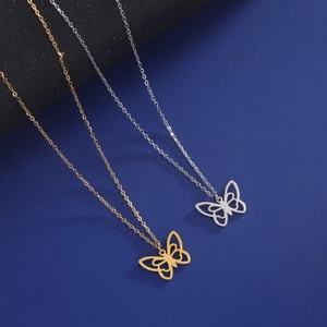 Colliers pendentifs papillon évidés élégants en acier inoxydable doré et argenté