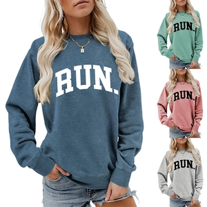 Detail view of cotton RUN letter print sweatshirt in blue, green, pink and grey colors