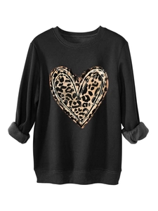 Detail of leopard print heart sweatshirt showing thick warm plush lining at the cuffs