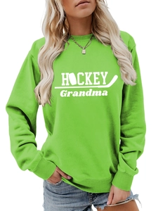 Détails des poignets côtelés et du tissu vert fluo du sweat-shirt Hockey Grandma
