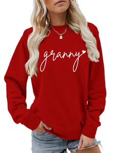 Close-up of a red crewneck sweatshirt with white granny lettering and heart detail