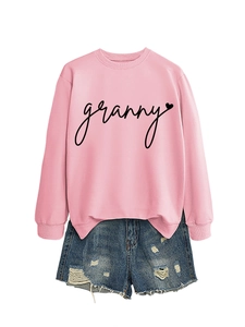 Detail of pink granny heart sweatshirt and distressed denim shorts two-piece set