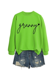 Neon green crewneck sweatshirt with granny heart print and ripped denim shorts set