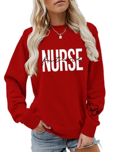Detail of red Nurse Future sweatshirt showing white text print and cuff heart logo