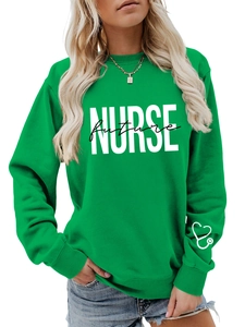 Detail of green crewneck sweatshirt with Nurse Future print and stethoscope on sleeve