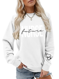 Close-up of NURSE future print and stethoscope heart detail on white sweatshirt sleeve