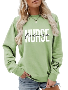 Detail of green Nurse Future sweatshirt with heart stethoscope print on the left cuff