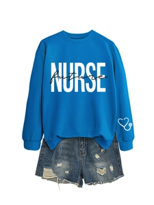 Flat lay of royal blue crewneck sweatshirt with Nurse Future print and denim shorts