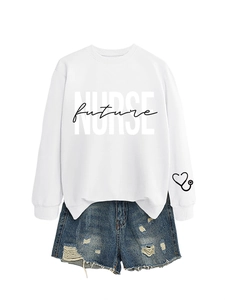Detail of white nurse future sweatshirt with heart stethoscope print on the sleeve