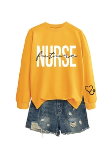 Detail of yellow Future Nurse sweatshirt with blue distressed denim shorts set