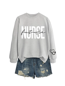 Detail view of light grey sweatshirt with Future Nurse text and heart stethoscope print