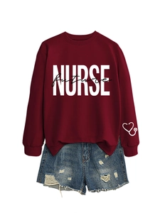 Detail view of burgundy nurse future sweatshirt with heart stethoscope embroidery