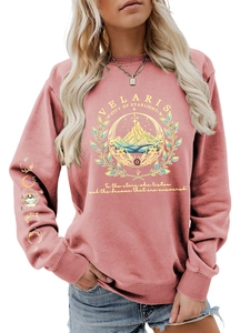 Close-up of Velaris print and moon phase sleeve detail on mauve crewneck sweatshirt