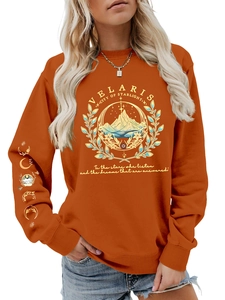 Close-up of Velaris sweatshirt featuring mountain stars print and moon phase sleeve detail