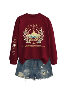 Flat lay of Velaris City of Starlight burgundy sweatshirt and denim shorts