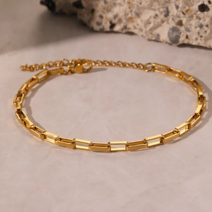 Bracelet chaîne à maillons trombone en acier inoxydable doré avec fermoir mousqueton