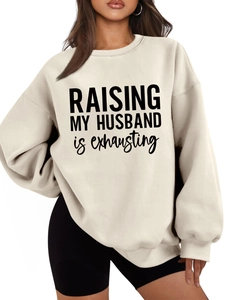Detail of soft cream oversized sweatshirt with Raising My Husband is exhausting print