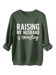 Detail of army green sweatshirt showing warm gray fleece lining and ribbed cuffs