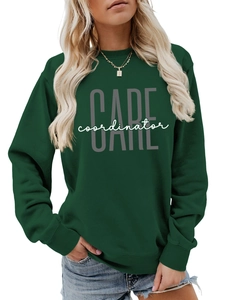 Detailed close-up of dark green sweatshirt featuring white Care Coordinator typography print
