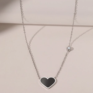 Minimalist silver chain necklace with black heart pendant and clear zircon accent