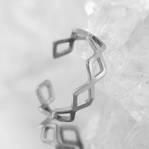 Minimalist silver geometric hollow ring with adjustable open design and polished finish