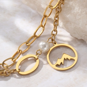 Bracelet double rang en acier inoxydable doré avec pendentif montagne et perle fine