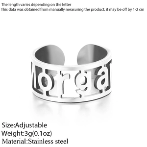 Adjustable silver stainless steel open ring featuring a custom cutout Morgan name design