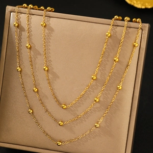 Bohemian multilayer stainless steel bead chain necklace in polished gold finish