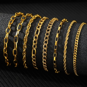 Assortment of gold stainless steel chunky chains including Cuban, Figaro and rope styles