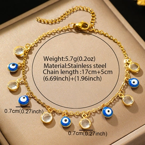18K gold plated stainless steel bracelet featuring blue evil eye charms and clear crystals
