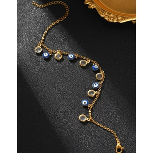 Gold-plated stainless steel Evil Eye bracelet with blue beads and crystals on black leather
