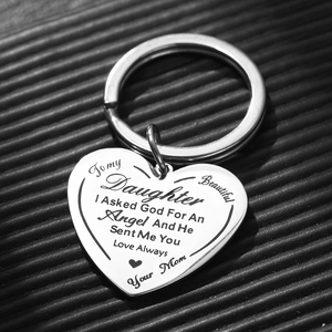 Polished stainless steel heart keychain with laser-engraved sentimental message for daughter