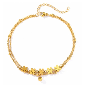 Double-layered golden daisy anklet with floral pendants and polished ball charm
