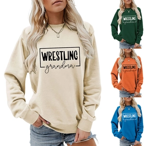 Four colors of long-sleeved crewneck sweatshirts with Wrestling Grandma print on the front