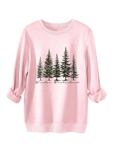 Detail of pink sweatshirt featuring Winter Wonderland forest print and ribbed cuffs