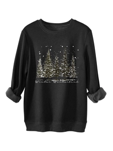 Detail of Winter Wonderland forest print on a thick black fleece-lined sweatshirt