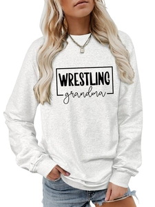 Close-up of Wrestling Grandma letter print on light grey crewneck sweatshirt fabric