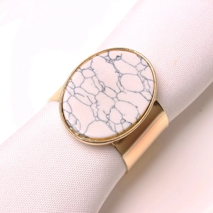 Modern marble stone napkin ring with gold metal band for elegant hotel table settings