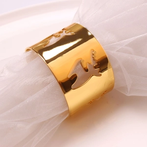 Polished gold napkin ring featuring intricate hollow elk design for Christmas table setting