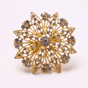 Detailed top view of gold butterfly napkin ring with sparkling crystal rhinestones