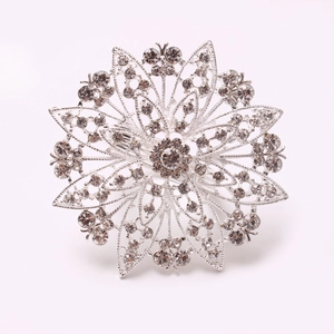 Silver flower napkin ring with sparkling rhinestones and hollow wire mesh petals