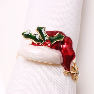 Christmas elf hat napkin ring with red enamel, holly leaves and gold star pendant